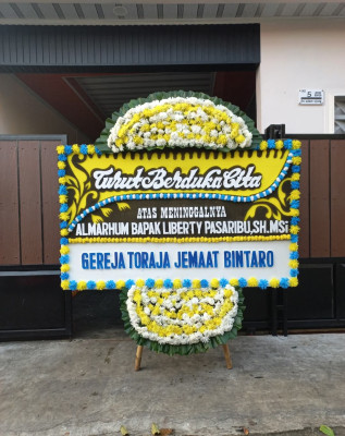 Papan Bunga Duka di Gogagoman